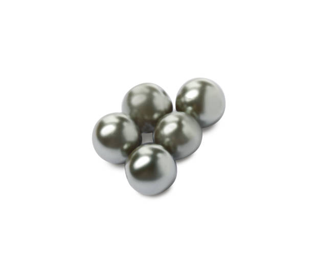 istock Many beautiful black oyster pearls on white background 1441238394