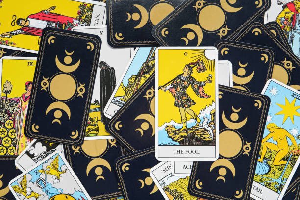 istock Many tarot cards as background, top view 1441238429