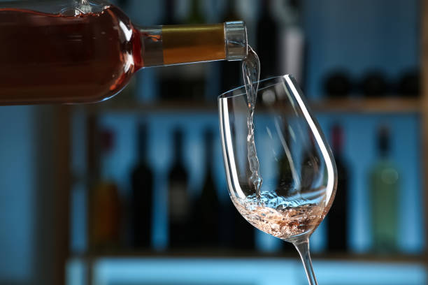 istock Pouring wine into glass in restaurant, closeup 1441240090