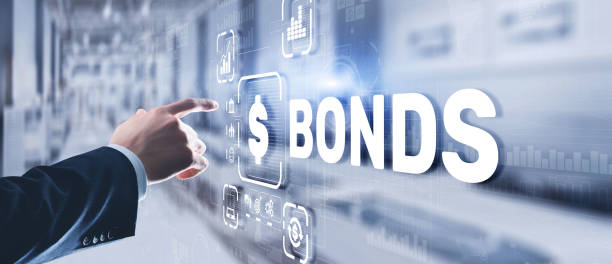 istock Businessman clicks a bonds virtual screen. Bond Finance Banking Technology concept. Trade Market Network 1441242449