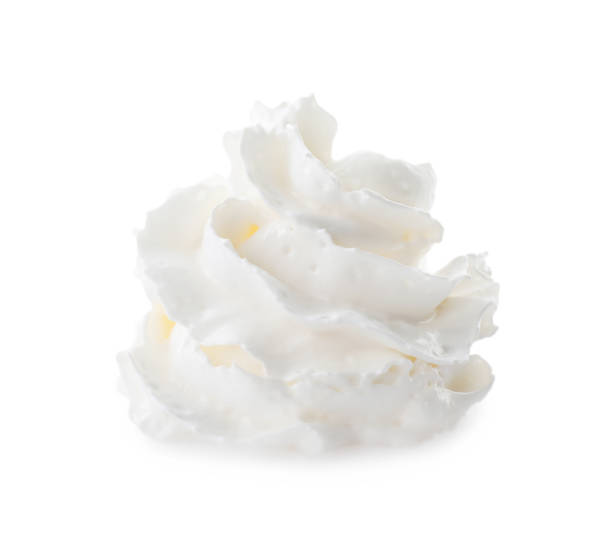 istock Whipped cream swirl isolated on white background 1441244444