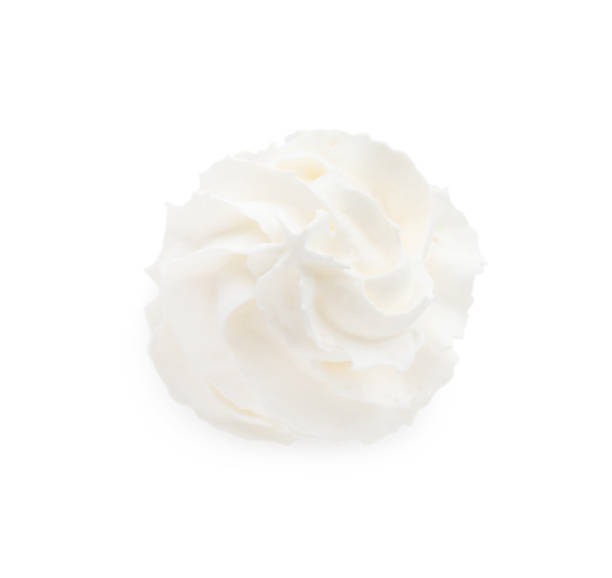 istock Whipped cream swirl isolated on white background, top view 1441244459