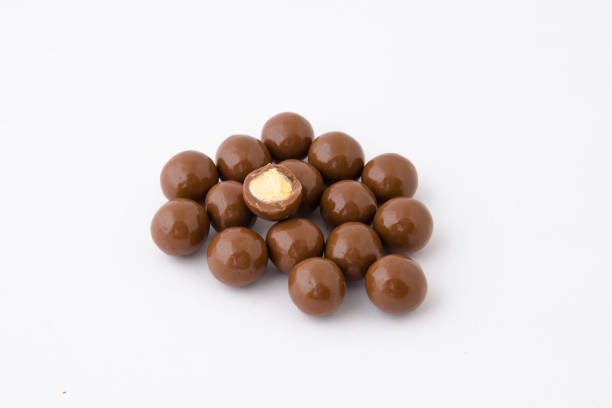 istock chocolate dragees as background hazelnut  -  Milk Chocolate Covered Hazelnut Dragee 1441248315