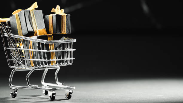 istock Shopping Cart with black box gift 1441248591