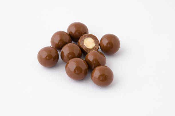istock chocolate dragees as background hazelnut  -  Milk Chocolate Covered Hazelnut Dragee 1441248916