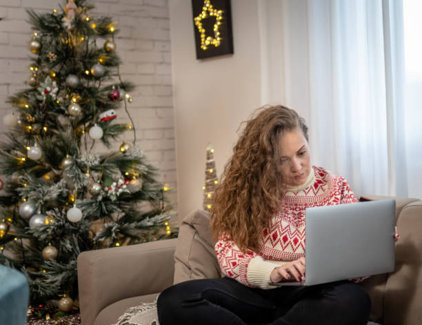 istock Woman making a credit card purchase 1441249078