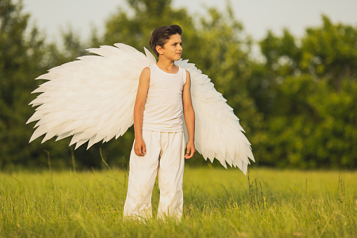 little girl dressed as an angel