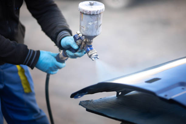 istock spray gun car body painting 1441250531