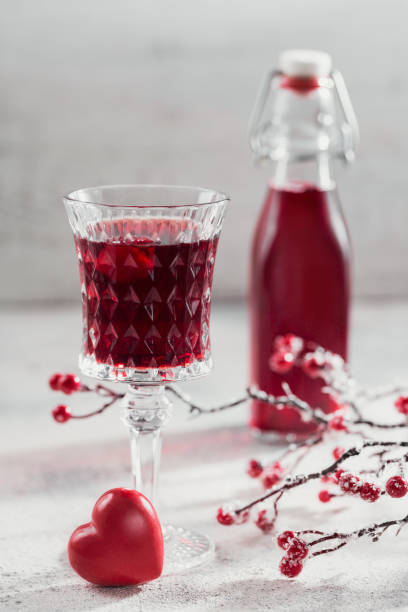 istock Red cocktail, vodka or liqueur and Heart shape decorations 1441253011