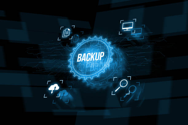 istock Data backup for data recovery to original or new location. Abstract hologram with icons 1441253883