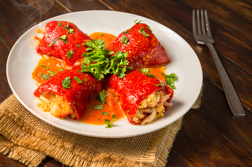 seafood stuffed peppers in sauce,  Spanish food