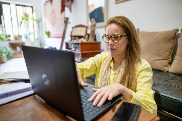 istock Woman studying at home 1441255284