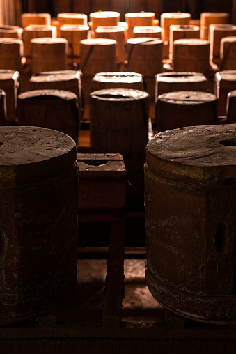 Old Porto wine cellar with wooden barrels in Porto, Portugal