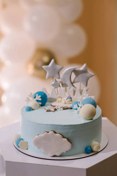 birthday cake with blue decor on a background balloons. baby shower party, newborn. celebration baptism concept. copy space. celebration concept. trendy winter cake. delicious reception. close up. - personal accessory balloon beauty birthday imagens e fotografias de stock