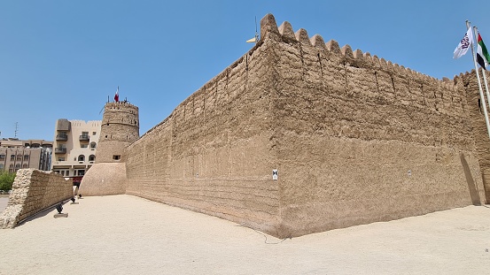 Dubai, United Arab Emirates – August 12, 2022: Walls of Al Fahidi Fort, the building houses the Dubai Museum.