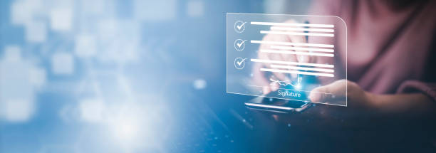 istock Signing electronic documents on digital documents Online, businessman with contract Electronic signature, e-signing, digital document management, paperless office, signing business contract concept, 1441262311