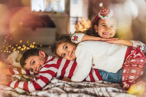 istock Happy children on Christmas Eve 1441262498