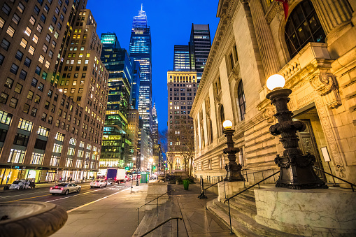 Scenic street and skyscrapers of New York City evening view, United States of America