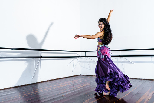 Group of young modern dancers dancing in the studio. Sport, dancing and urban culture concept