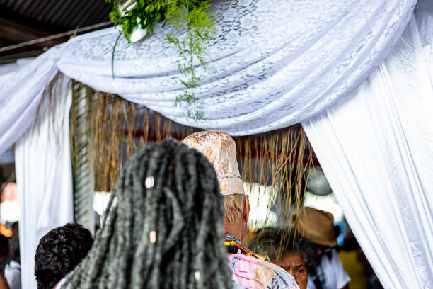 i membri del candomble sono visti durante una manifestazione religiosa - african descent african culture drum history foto e immagini stock