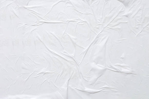 istock white crumpled and creased paper poster texture background 1441275761