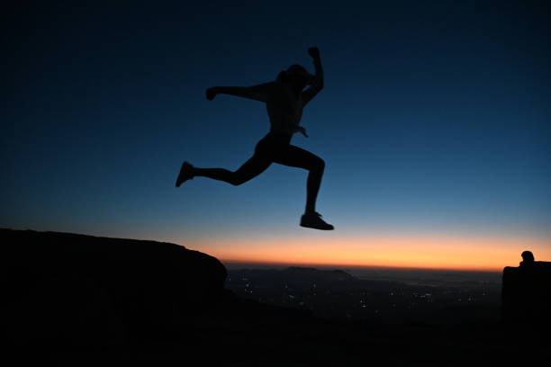 istock Backlit silhouette yoga 1441276060
