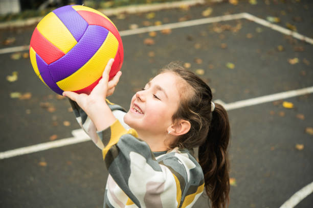 Little girl is playing outside
