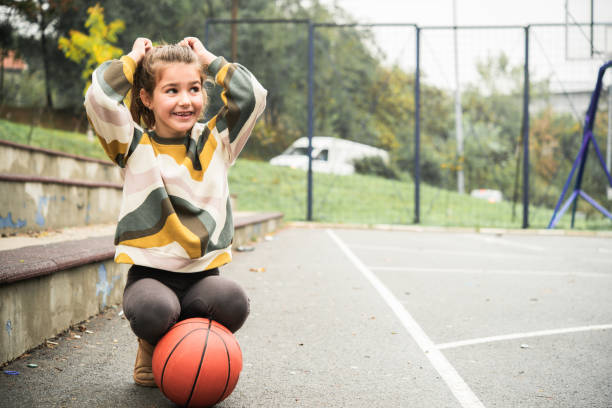 istock Little girl is playing outside 1441278941