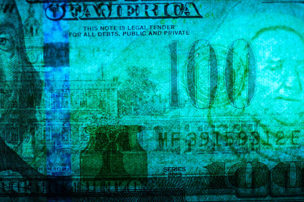 depth, colorful light close-up $100 US dollar banknote