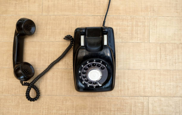 istock Old black retro rotary Telephone 1441290040