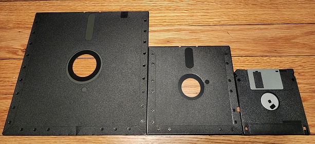 Three different sized floppy disks
