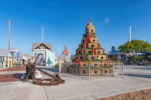 Key West Christmas A Christmas tree made out of lobster traps and an old anchor decorate the key west harbor florida christmas stock pictures, royalty-free photos & images