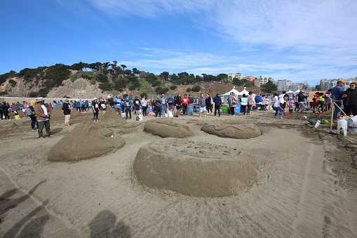10-15-2022:San Francisco, California: SandKastle tournament in San Francisco. People making sand scultpures in teams