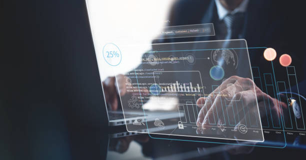 istock Data analysis. Businessman using laptop and digital tablet analyzing business data, marketing report information on futuristic virtual interface screen. Algorithm. marketing, Business Intelligence concept 1441302589