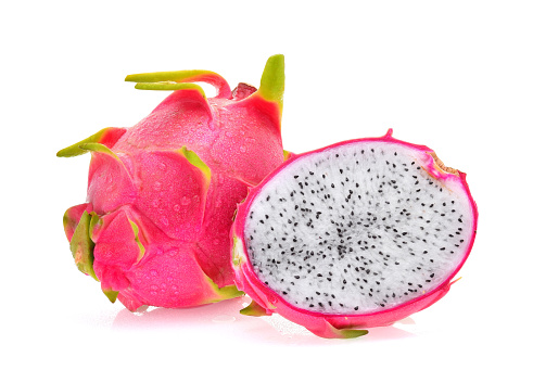 White dragon fruits or pitaya whole and halved isolated on white background