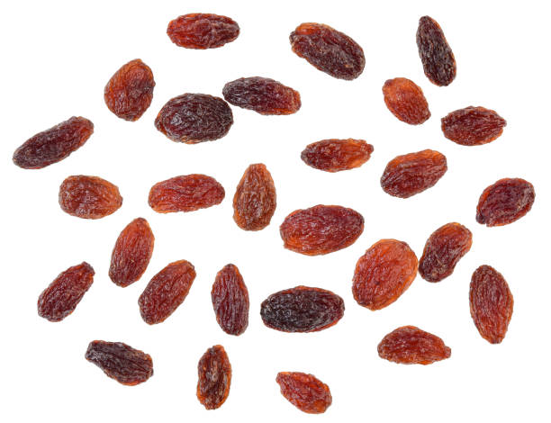 istock Top view of Dried raisins isolated on white background 1441306017