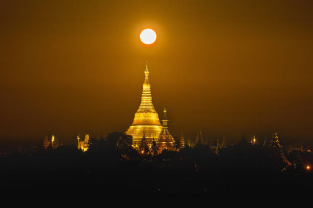 landscape scenery of Shwedagon pagoda on hill in Yangon Myanmar during sunset