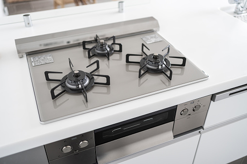 Close-up of gas stove in system kitchen