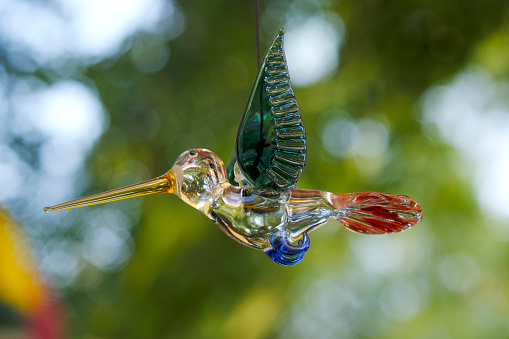 Colorful glass art crafting, hanging bird home decor item, handmade Craft.