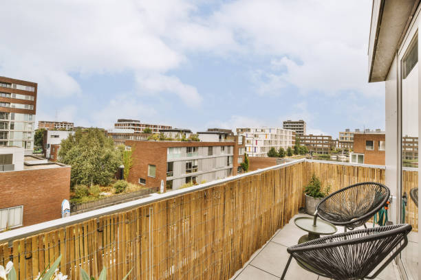 istock A long balcony with a straw fence and chairs 1441312954