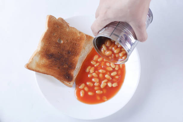 istock Tasty baked beans, egg and bread for morning break fast 1441314093