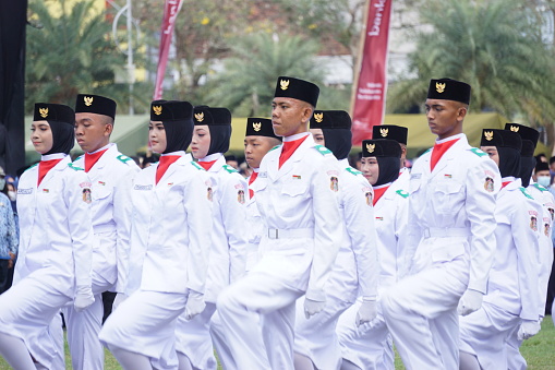 Blitar, East Java, Indonesia - August 17th, 2022 : Indonesian flag raiser (paskibraka) in independence day ceremony