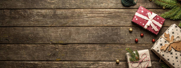 istock Creative layout of Christmas tree branches with a Christmas gift. flat lay. Nature New Year concept. 1441321851