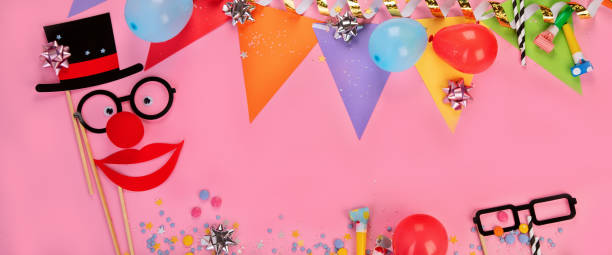 istock Funny faces on party pink background. 1441322931