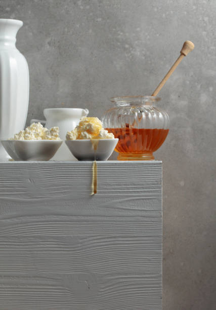 istock Fresh cottage cheese or ricotta with honey. 1441323948