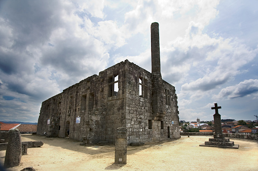 Ruins of Barcelos Earl's Palace was built in 15th century.  Barcelos, Portugal. Dramatic sky background, wide angle.