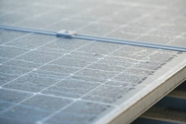 istock Dew drops and dust on the solar panel, Dust blocking off the sunlight exposure to reduce efficiency of solar energy. 1441328282