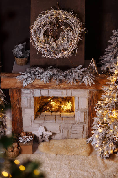 istock close-up decorated christmas fireplace with lights at night 1441330080