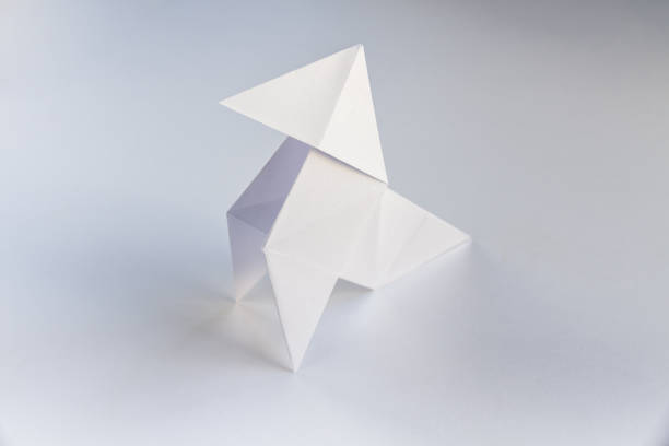 istock Paper hen origami isolated on a white background 1441331220