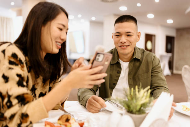 istock Happy couple having breakfast the the hotel restaurant 1441335137